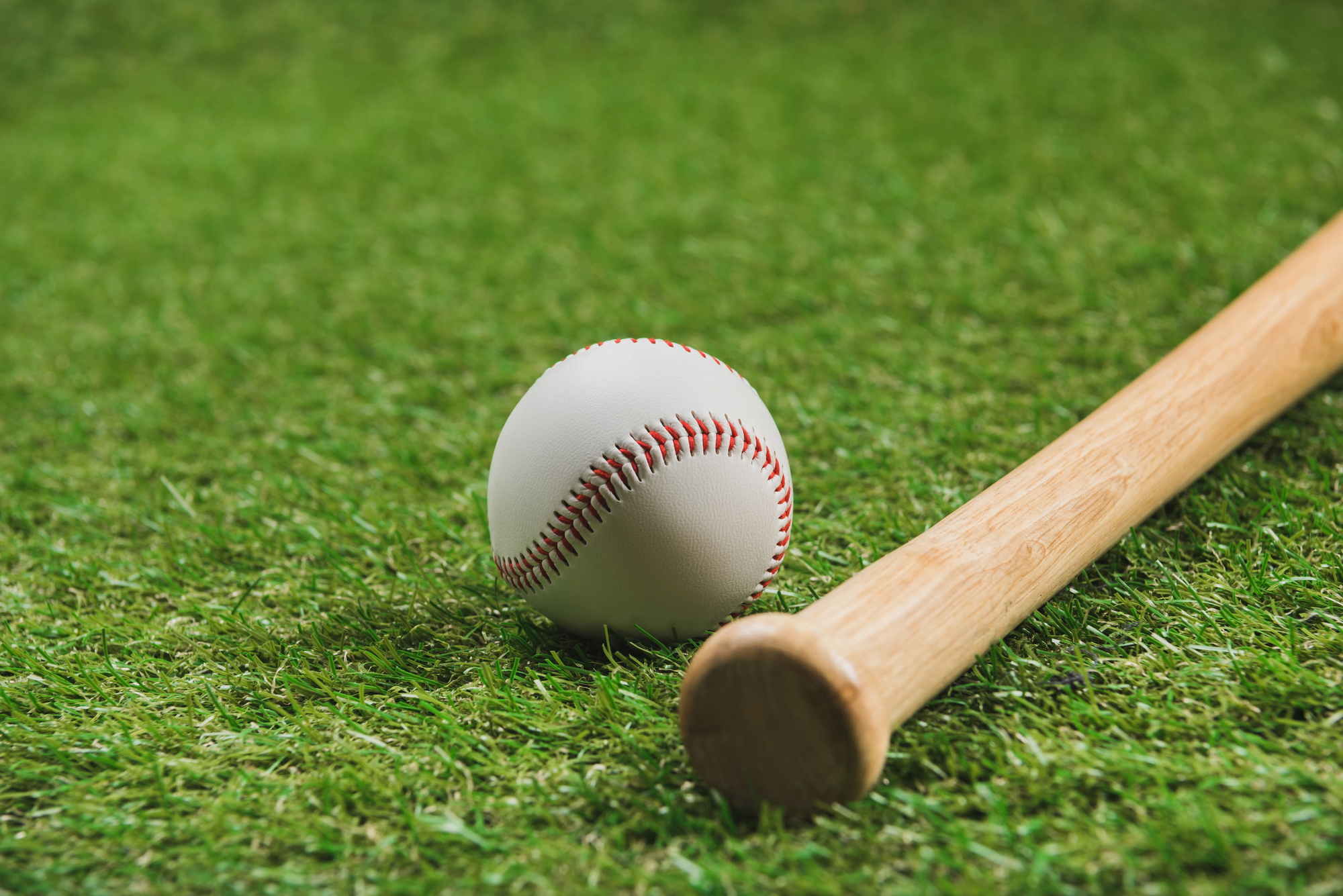 Baseball bat and ball
