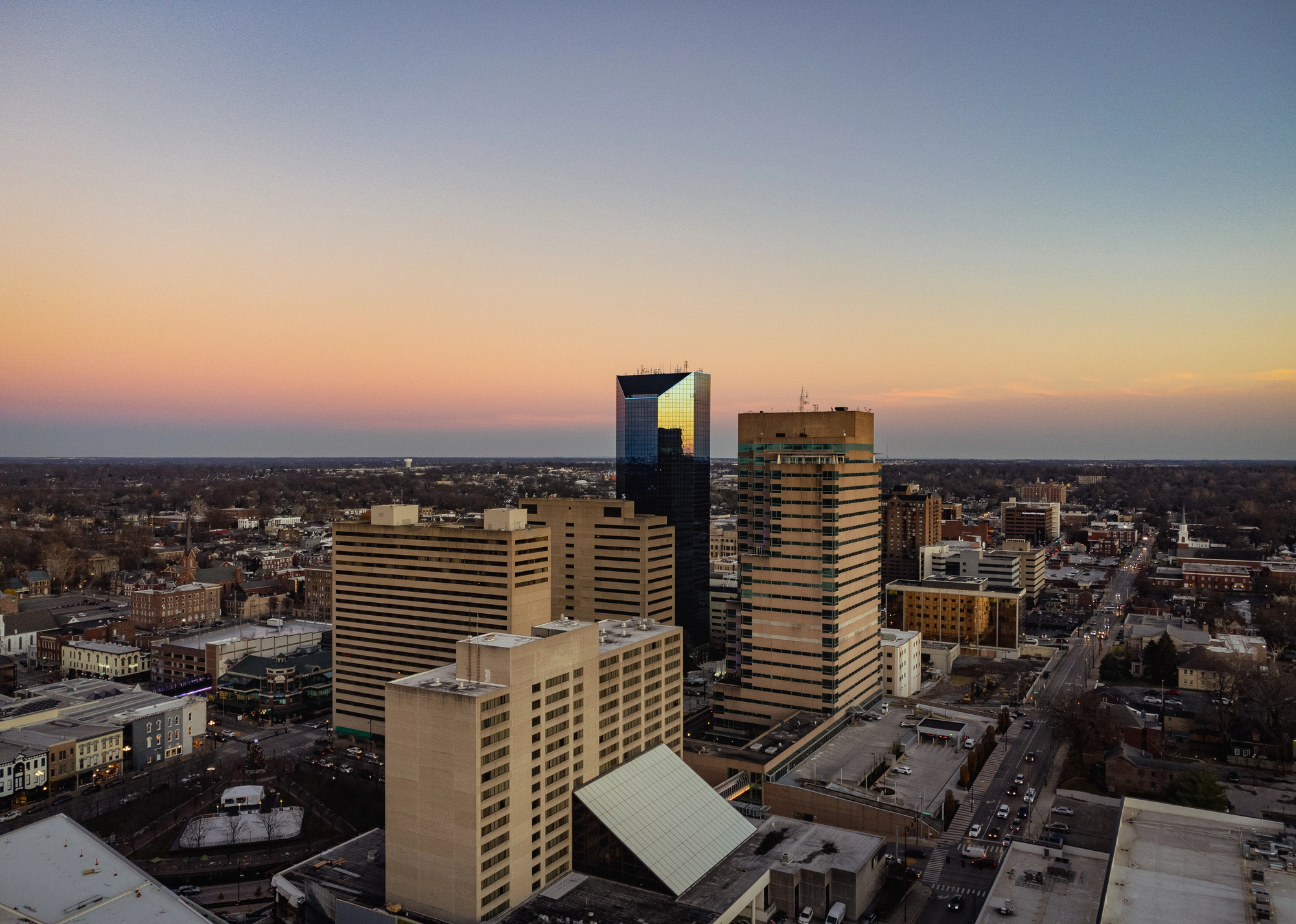 Lexington Kentucky downtown district during sunset reflecting on the shiny buildings